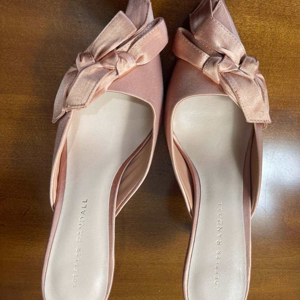 Like new - never worn. Blush color, satin material